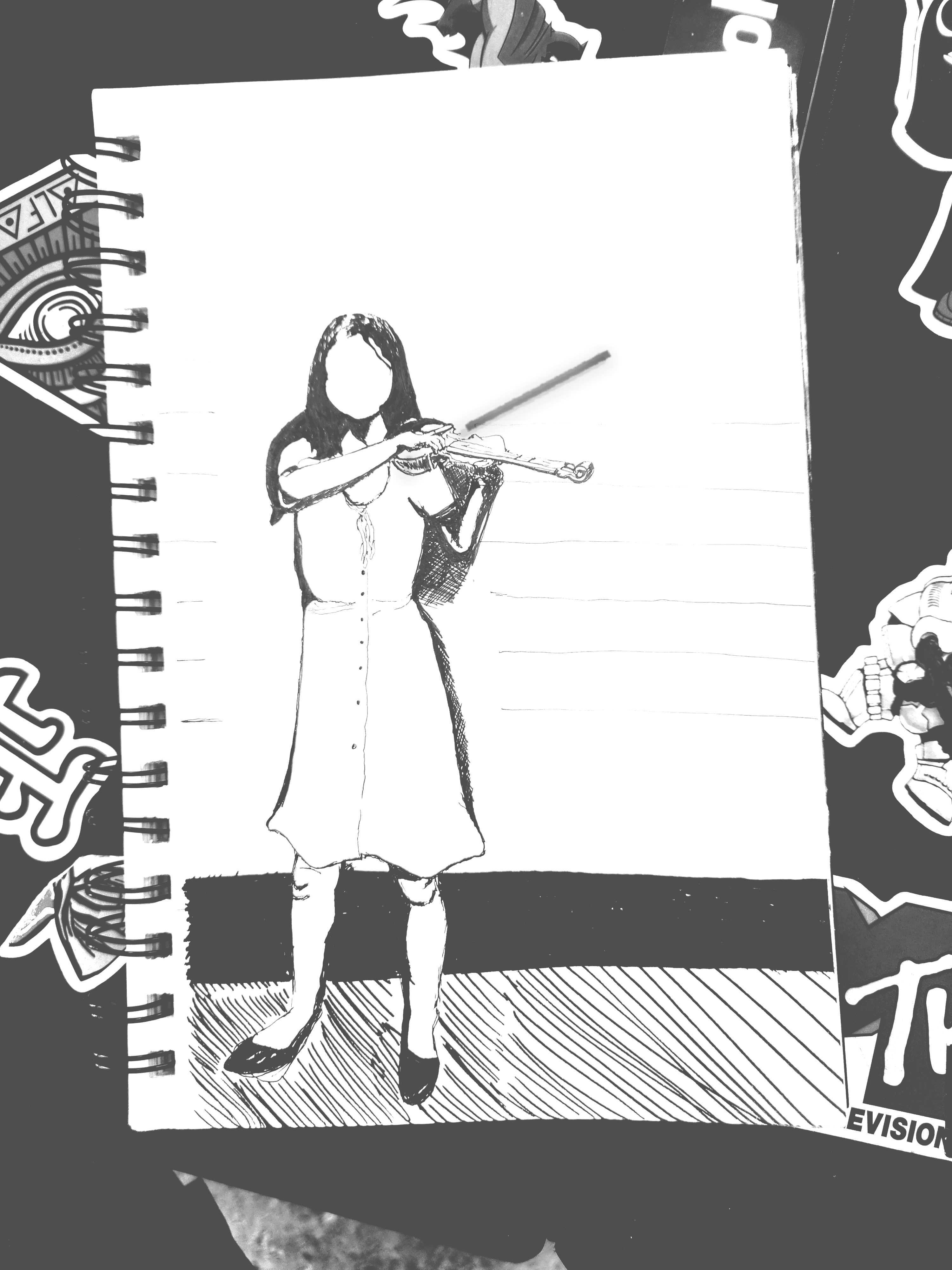 Pen and ink sketch of a standing figure in a dress playing a violin, drawn in a sketchbook.